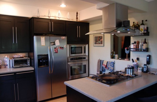 Sullivan's Gulch Condo | MEDITERRANEAN URBAN VILLA