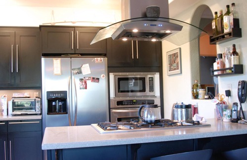 Sullivan's Gulch Condo | MEDITERRANEAN URBAN VILLA