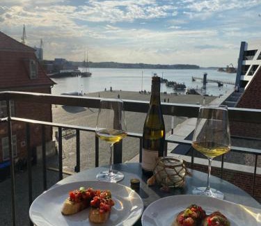 Wismar Apartment | Meerblick, Balkon und private Sauna im historischen Getreidespeicher