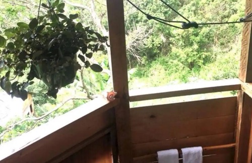 Cave Cottage | Mel’s Botanical Retreat “Blue Mahoe” Cottage