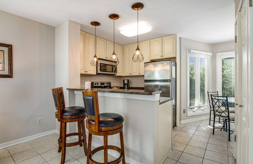 Isle of Palms Villa | Memorable end unit w/shared pool with ocean views, shared grill, & more
