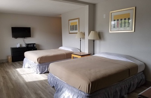 Beaumont Hotel | Merit Inn & Suites