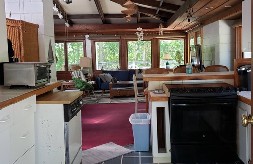 Truro House | Mid Century 3 bedroom house in private wooded setting.