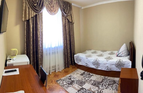 Yuzhno-Sakhalinsk Hotel | Mini-Hotel Logos
