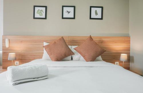 Cikarang Apartment | Minimalist and Cozy Stay 1BR Apartment at Mustika Golf Residence By Travelio