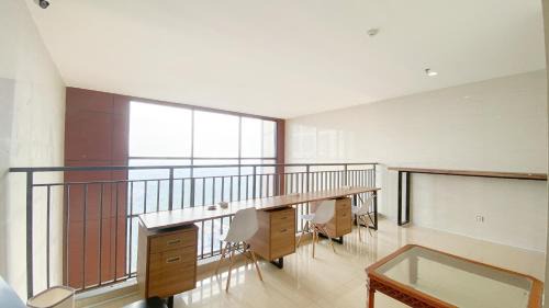 Pondokcina Apartment | Minimalist and Homey Studio at Evenciio Margonda Apartment By Travelio