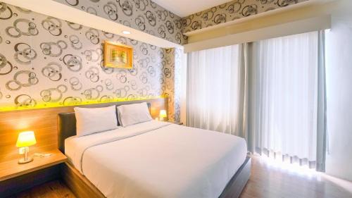 Bogor Apartment | Minimalist Studio at 11st Floor Bogor Icon Apartment By Travelio