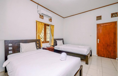 Caringin Apartment | Minimalist Studio Room At Graha Wishnu Guest House