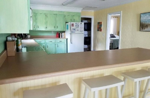 Gulf Shores Cottage | Minutes from beach with Bay view, pier, fenced yard & dog friendly!