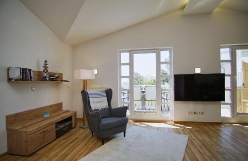 Gohren Apartment | mit Meerblick und Balkon, strandnah, gratis Nutzung vom AHOI Erlebnisbad und Sauna in Sellin - Meeresblick FeWo 51