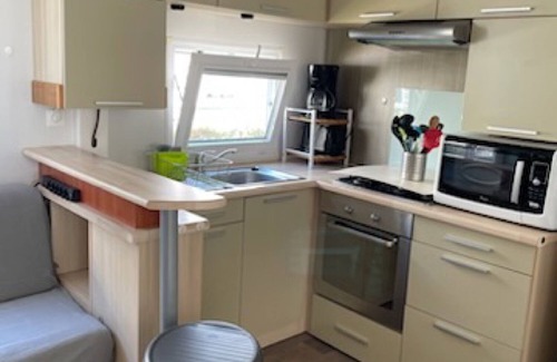 Les Moutiers-en-Retz RV Rental | Mobile Home 'Mobil-home Kapa - Proche Mer' with Shared Pool, Private Terrace and Private Garden