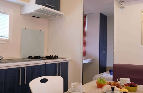 Santa Lucia House | Mobilehome with air conditioning, pool and semi-covered wooden terrace