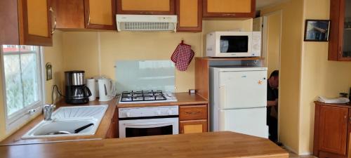 Le Bec-Hellouin Other | Mobilhome "La Chaloupe" dans le Camping Saint Nicolas