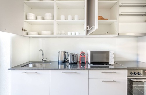 Sihlfeld Apartment | Mod Wiedikon 2.5 Room w/Storage & W/D, 1 min to Market, by Blueground