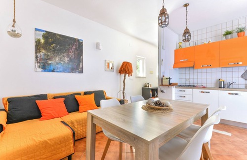 Lacona Apartment | Modern apartment with garden, air conditioning and Wi-Fi