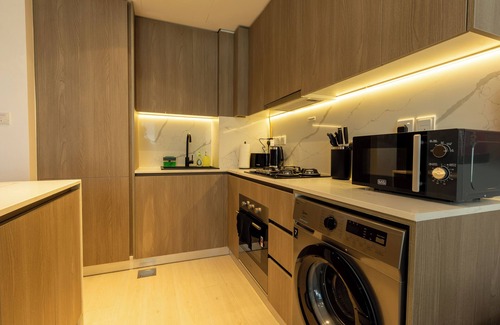 Motor City Apartment | Modern 1-bedroom with WiFi, fitness room in fabulous Dubai