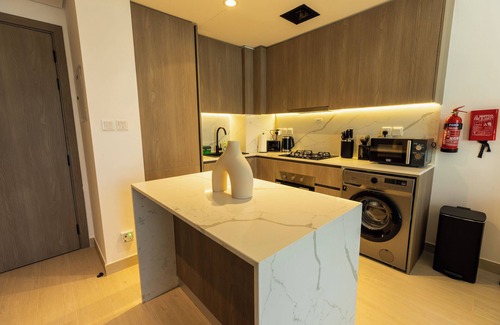 Motor City Apartment | Modern 1-bedroom with WiFi, fitness room in fabulous Dubai
