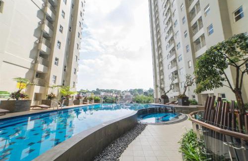 Hegarmanah Apartment | Modern 1BR Apartment Near Cihampelas at Parahyangan Residence By Travelio