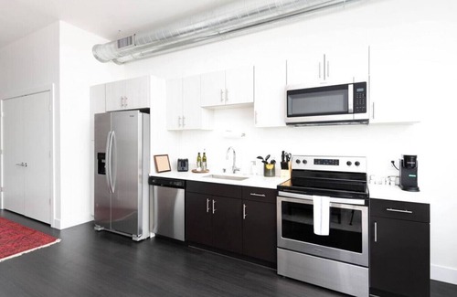 Milwaukee Apartment | Modern 1BR Apt with Skywalk to Fiserv, Rooftop, and Parking