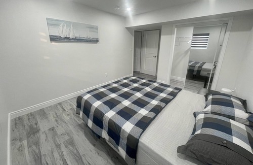 Woodslee House | Modern 1BR Basement Retreat
