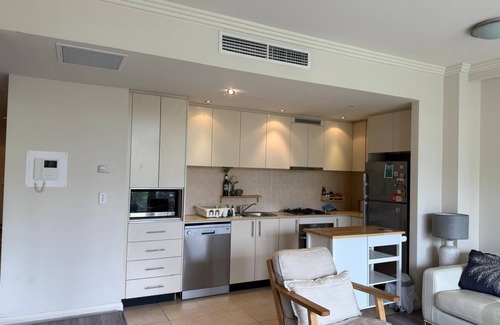 Meadowbank Apartment | Modern 1BR- Unbeatable Location - Steps to Train, Wharf & City Fun!
