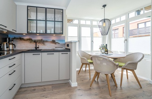 Wenningstedt-Braderup Apartment | Modern 2-room vacation apartment with balcony, by the village pond.