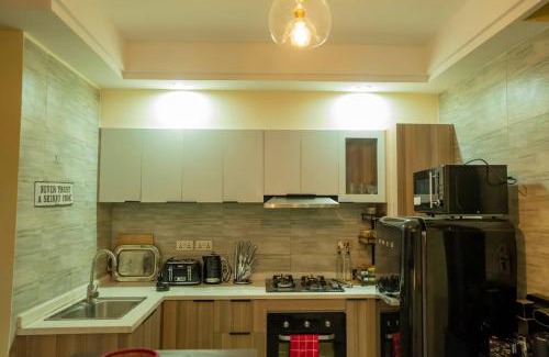 Nairobi Apartment | Modern 2BR Apartment Pool & Balcony