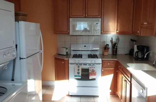 Wildwood Crest Condo | Modern 2BR condo with LARGE in-ground pool and BBQ Area! Great for entertaining