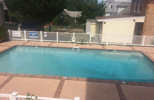 Wildwood Crest Condo | Modern 2BR condo with LARGE in-ground pool and BBQ Area! Great for entertaining