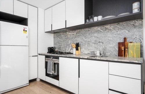 Melbourne Central Business District Apartment | Modern 2BR Getaway, Prime CBD, Balcony, Pool, Gym