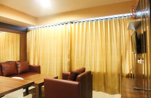 Bekasi Barat Apartment | Modern 2BR Grand kamala Lagoon Apartment By Travelio