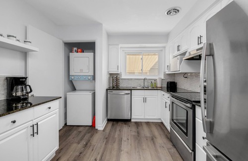 Windsor House | Modern 2BR with Remote Workspace, Patio, BBQ & Gym