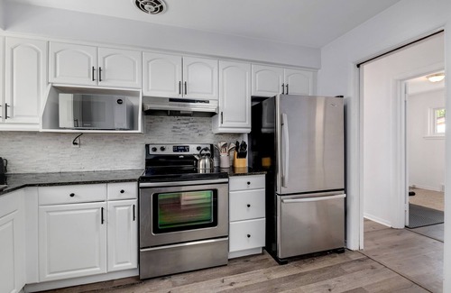 Windsor House | Modern 2BR with Remote Workspace, Patio, BBQ & Gym