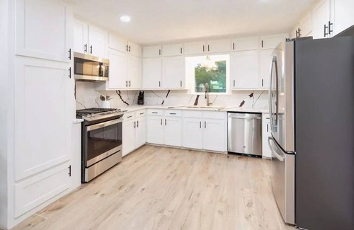 Bryan House | Modern 4BR/3BA Home, Game Room, Yard + Firepit