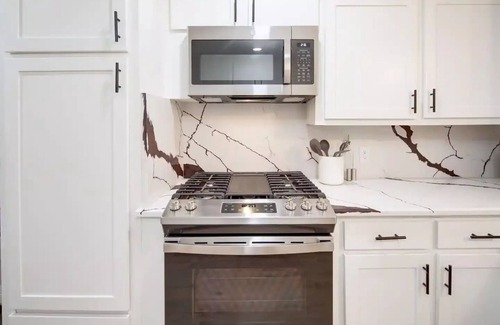 Bryan House | Modern 4BR/3BA Home, Game Room, Yard + Firepit