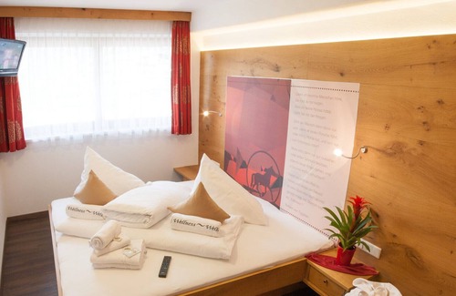 Mayrhofen Apartment | Modern 4SZ penthouse with roof terrace, glass outdoor sauna, directly at the cable car
