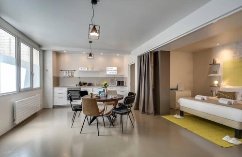 Quartier Sainte-Avoye Apartment | Modern and eclectic 3BD duplex in Le Marais!