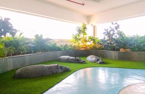 Pekayon Jaya Apartment | Modern and Spacious Studio with City View @ Grand Kamala Lagoon Apartment By Travelio