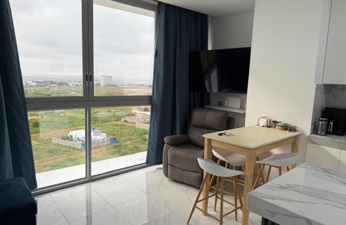 Punta Blanca Apartment | Modern apartment with AC and fitness room in tranquil Punta Blanca