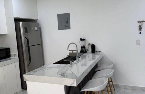 Punta Blanca Apartment | Modern apartment with AC and fitness room in tranquil Punta Blanca