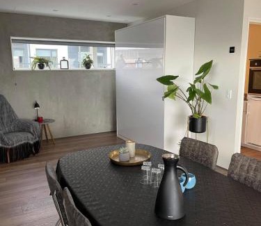 Hoyvik Apartment | Modern Apartment With City & Oceanside View