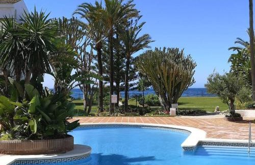 Marbella Apartment | Modern apartment with pool on the beachfront in Marbella by SharingCo