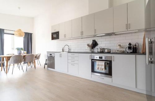 Bastad House | Modern Beachy Home with Terrace Charm First Floor