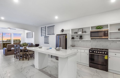 La Paloma House | Modern beauty with partial ocean view, open concept, & balcony- dog-friendly