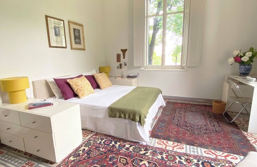 Parma Bed & Breakfast | Modern bedroom with bathroom at VILLA SPERANZA