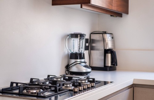 Arrecife House | Modern & centrally located with private pool & BBQ - Walk to Everything!