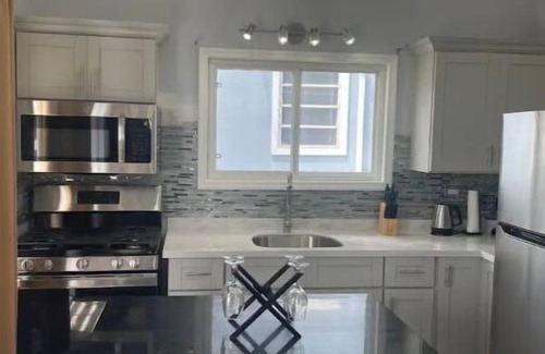 St. John's Cottage | Modern Chic 1 bedroom Cottage -walk to beach
