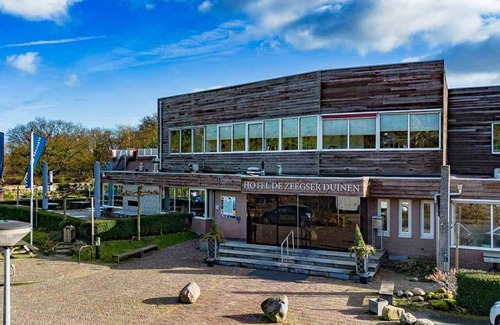 Zeegse Apartment | Modern Comfort Meets Nature: Pool, Sauna, and Trails Right Outside Your Room