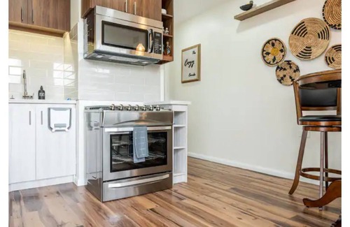 Arouca Condo | "Modern Comfort Near Airport & Shopping - The Cozy Condo"
