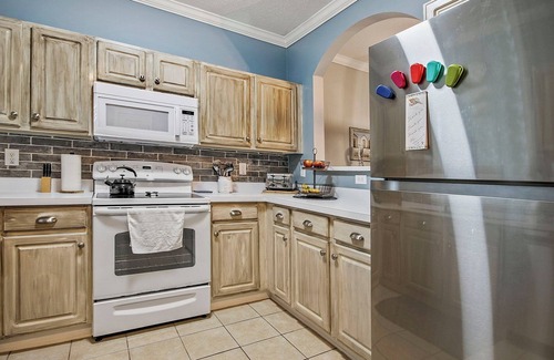 North Myrtle Beach Condo | Modern condo across from pool, near beach and on 9th hole of Norman golf course!